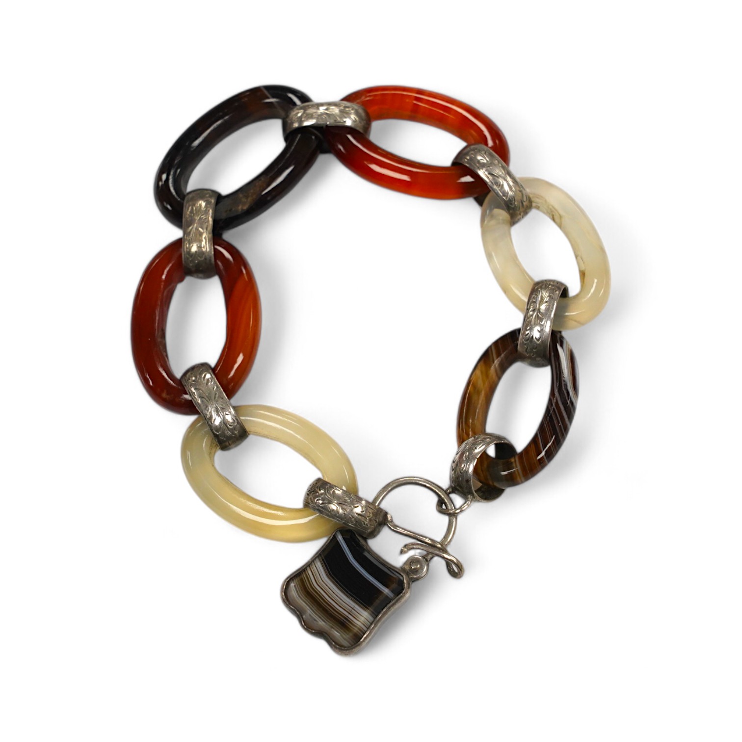 A white metal, carnelian and banded agate set loop link bracelet, 14cm. Condition - poor